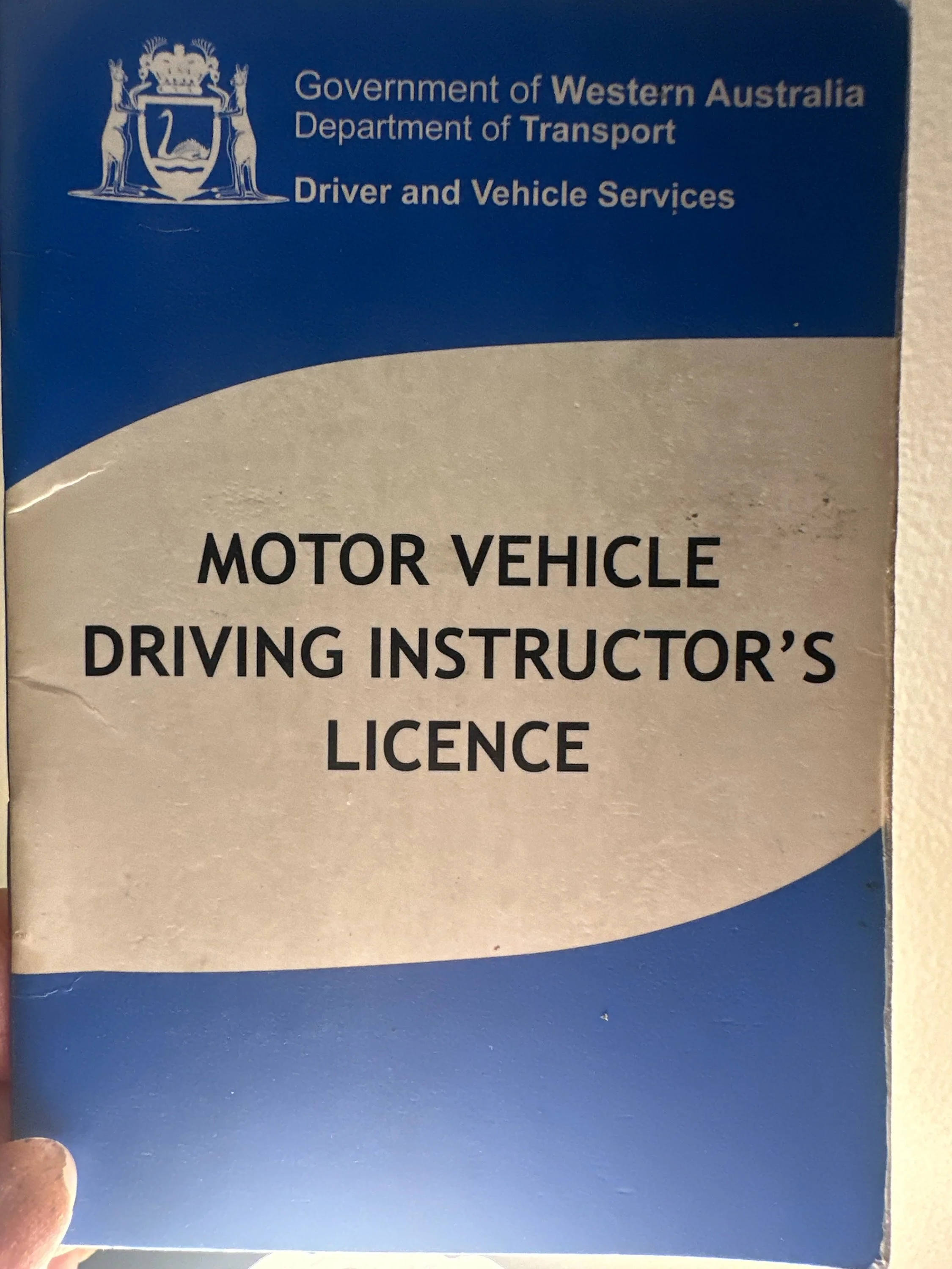 A Motor Vehicle Driving Instructor's Licence book.
