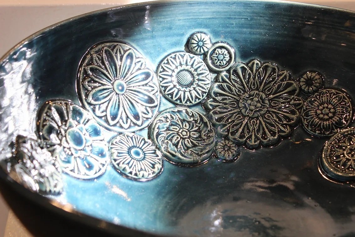 Large handbuilt bowl with medallions, 2025. Photography by Rakaia Kenney.