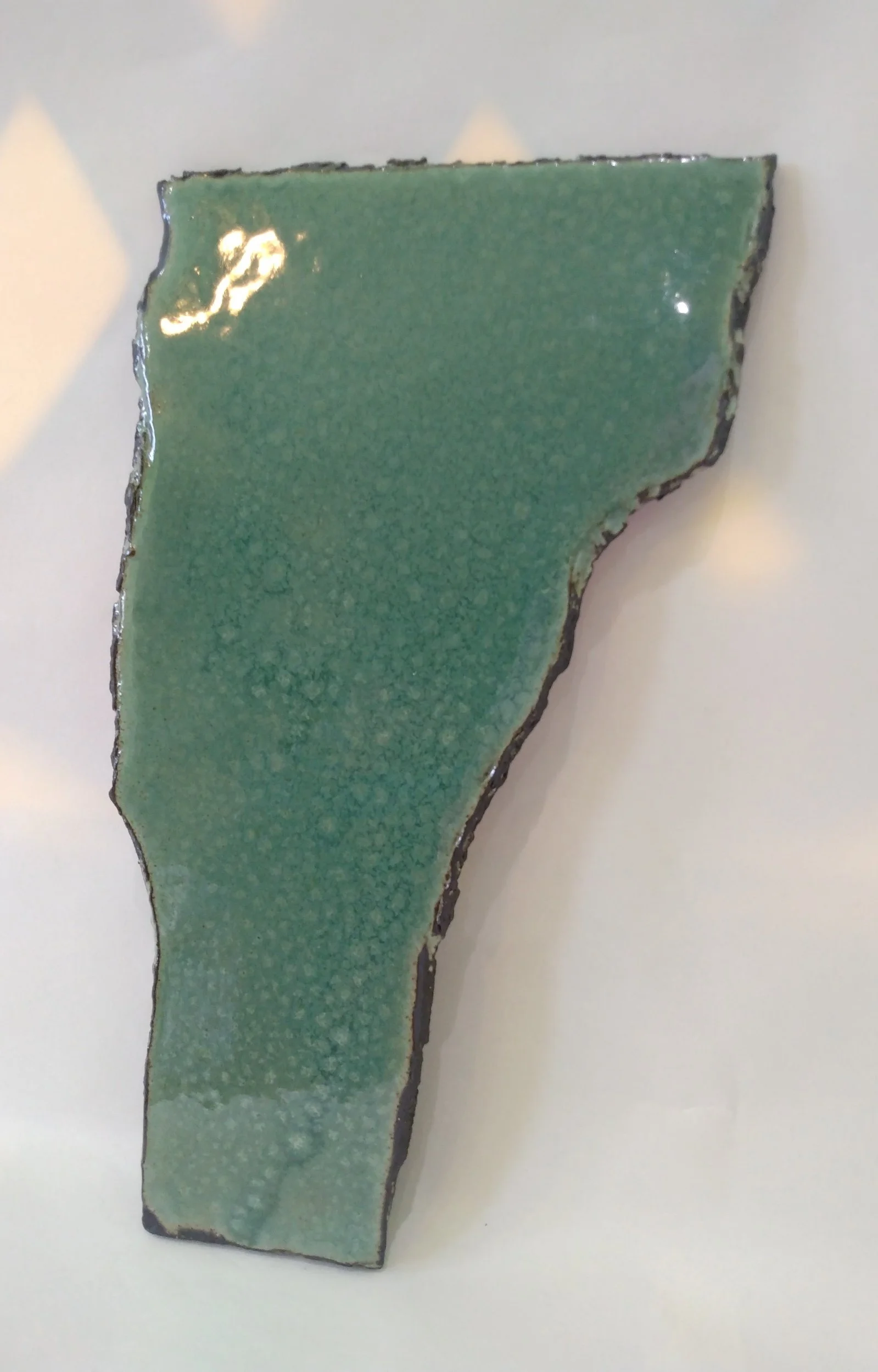 Vermont, jade on black clay, 2025
