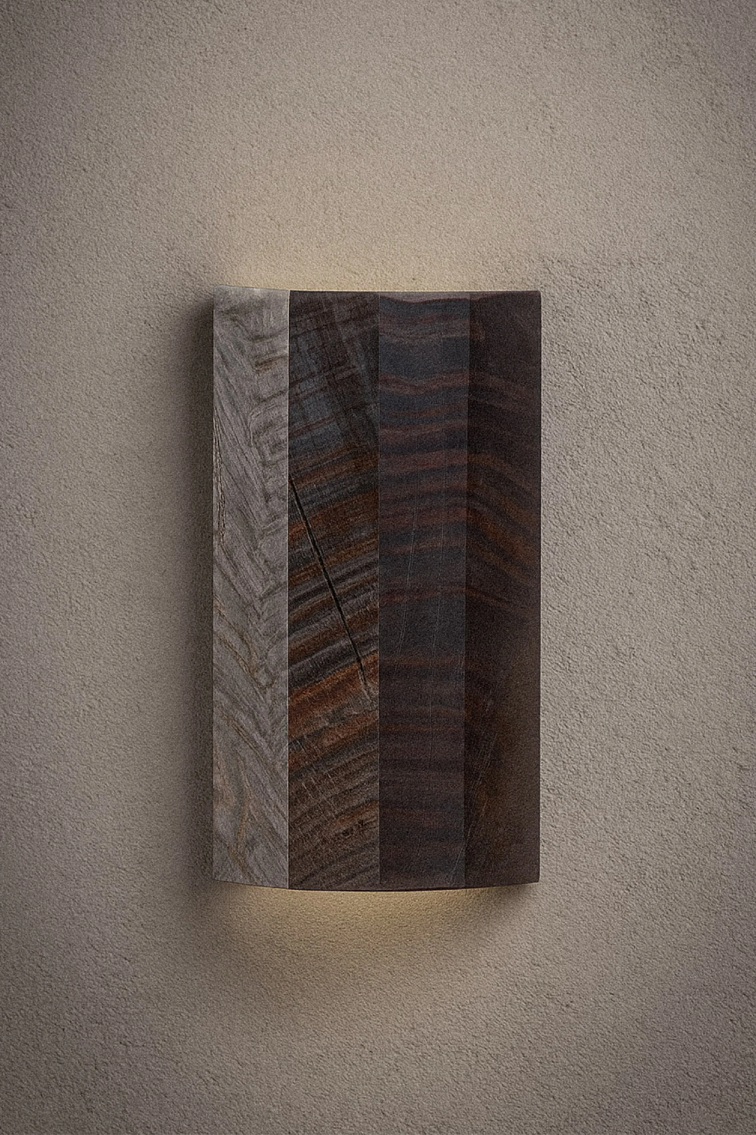 Wall-mounted light fixture made of vertically aligned dark and light wood panels