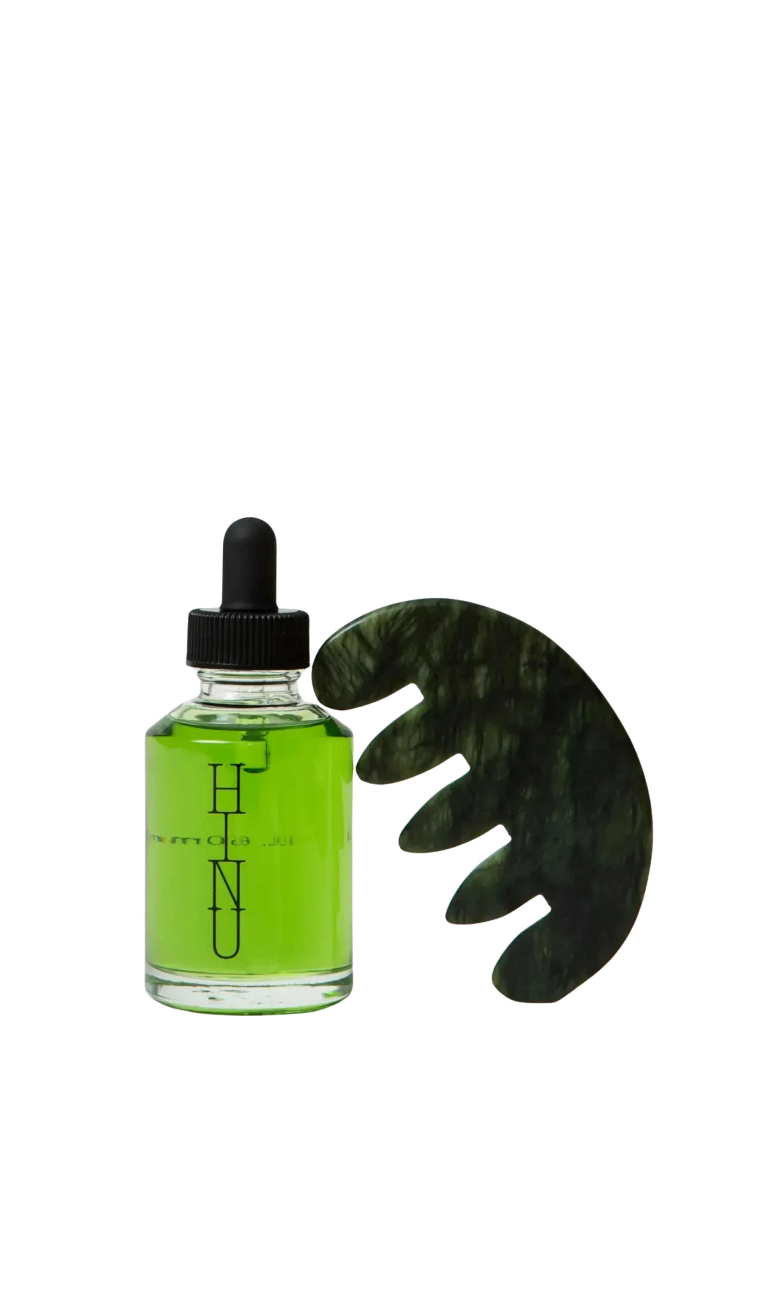 Green botanical scalp and hair oil, with a jade comb package together for a holiday duo