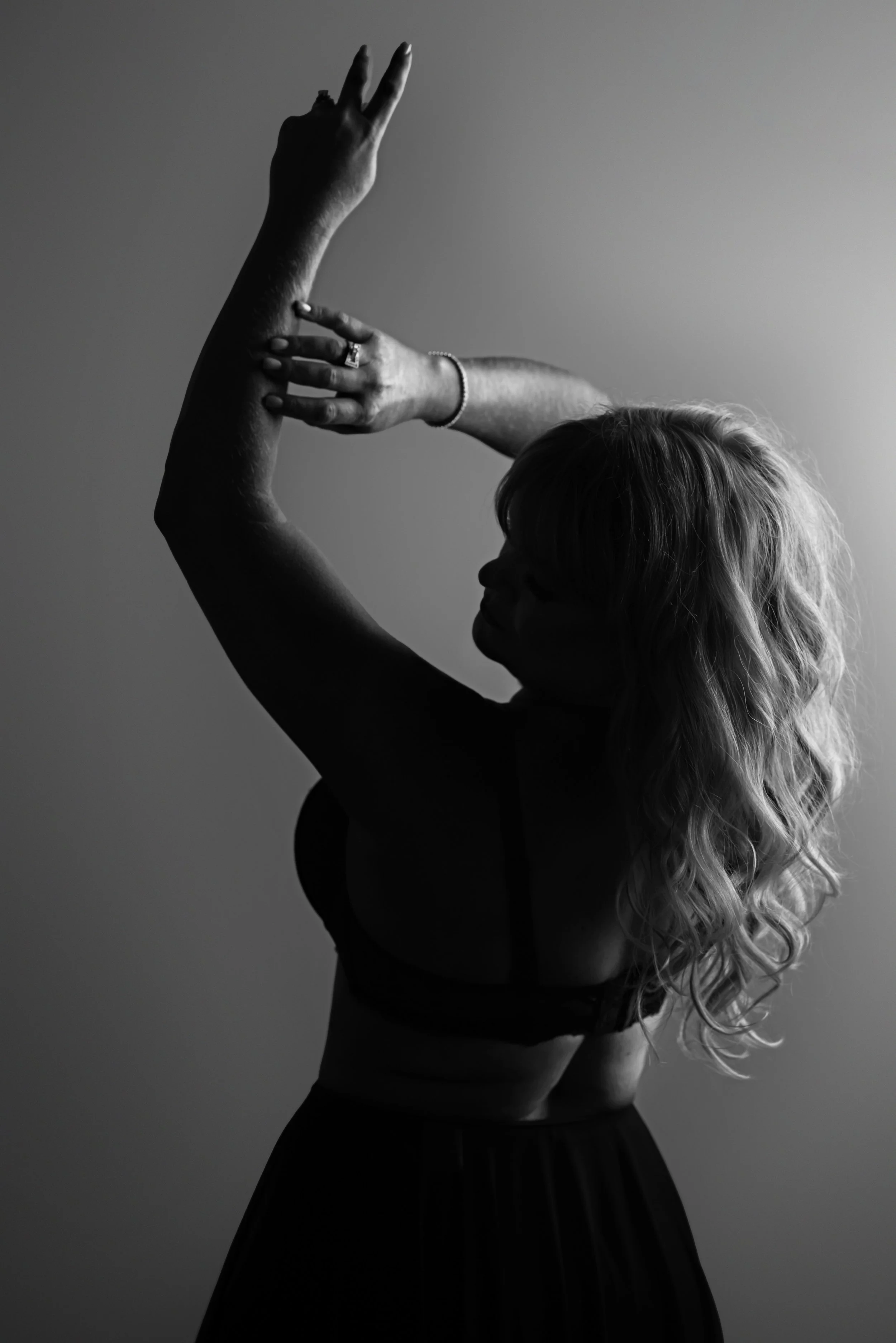 Sassy woman in gold sequin dress.