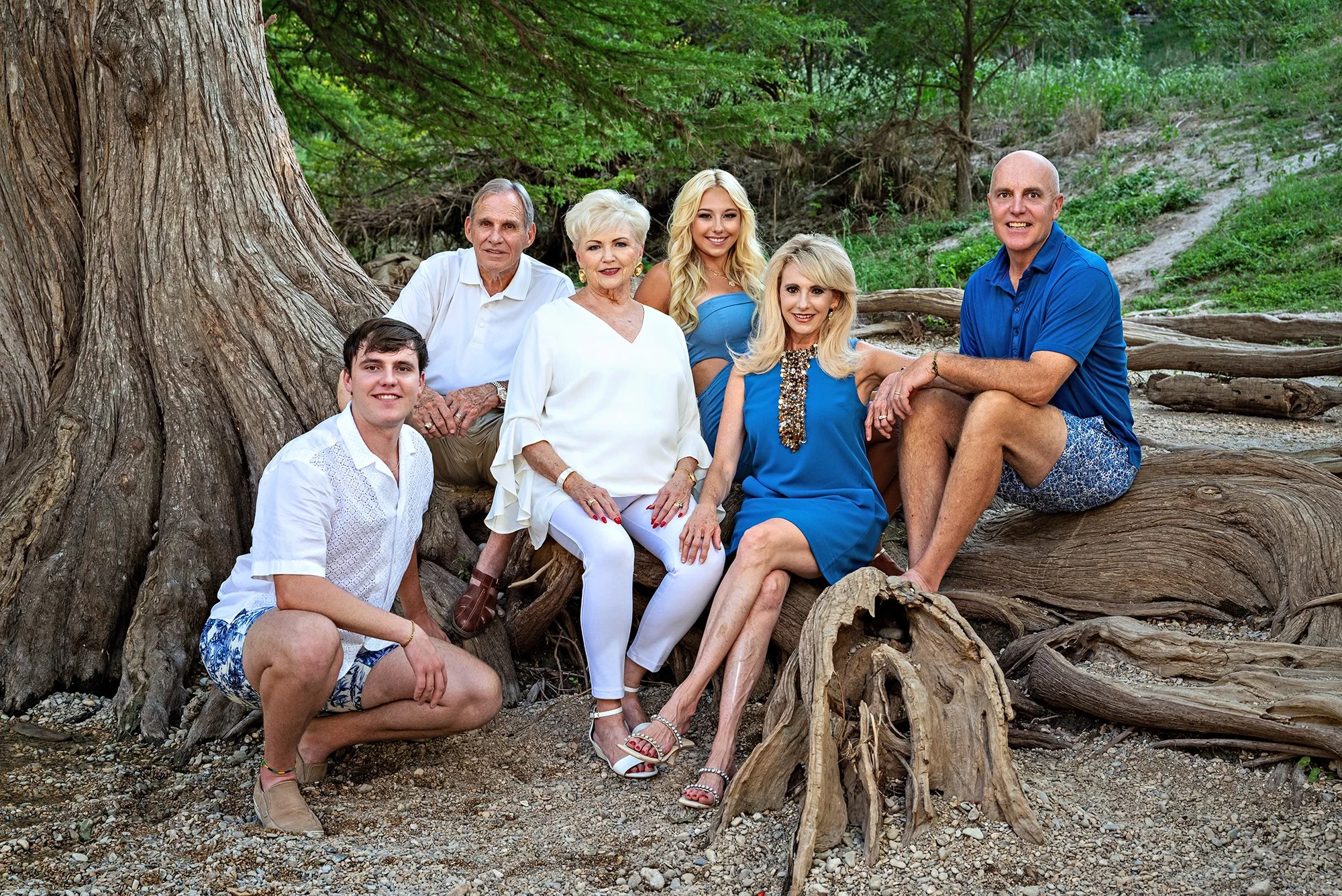 Generational portrait of a family posed on the banks of the Guadalupe River.