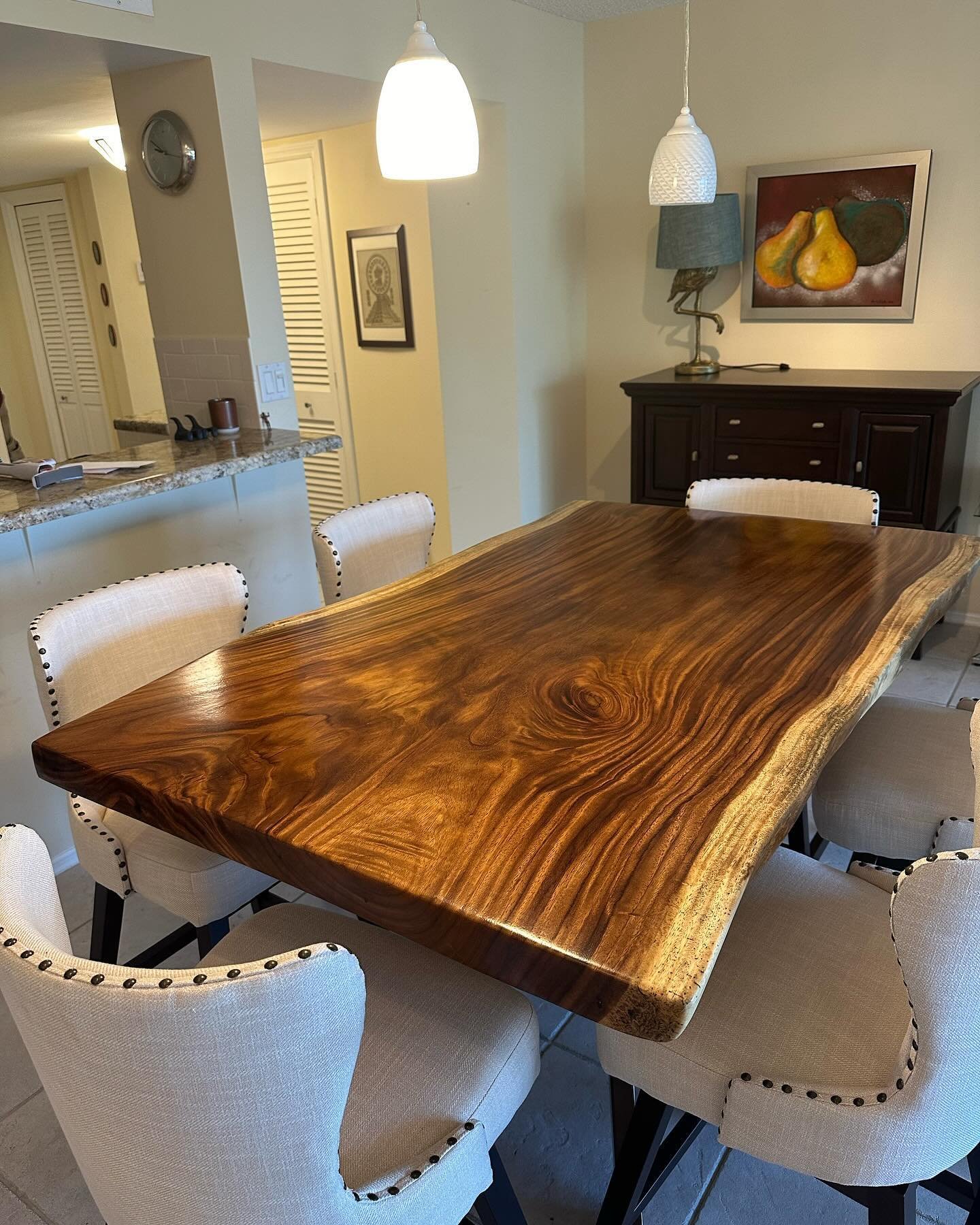 Stunning high-top table designed to bring warmth to this space. The natural beauty of the wood grain shines through. Perfect for gathering and making memories. Swipe to see before and after ⬅️

#monkeypod #liveedge #stunning #homedecor #diningroom #c