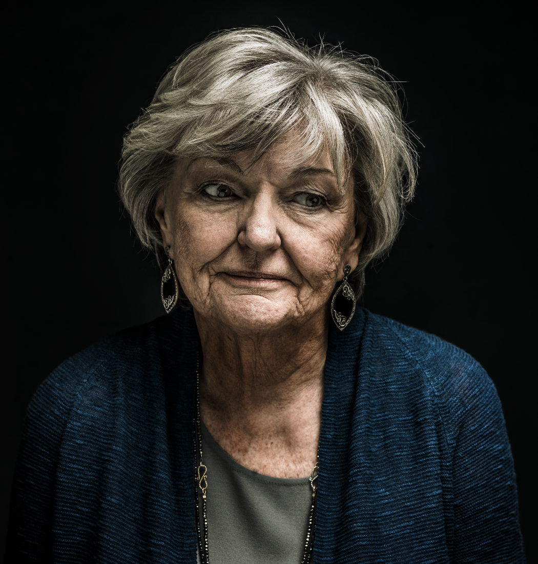 Artistic and edgy portrait of an older woman showing exasperation 