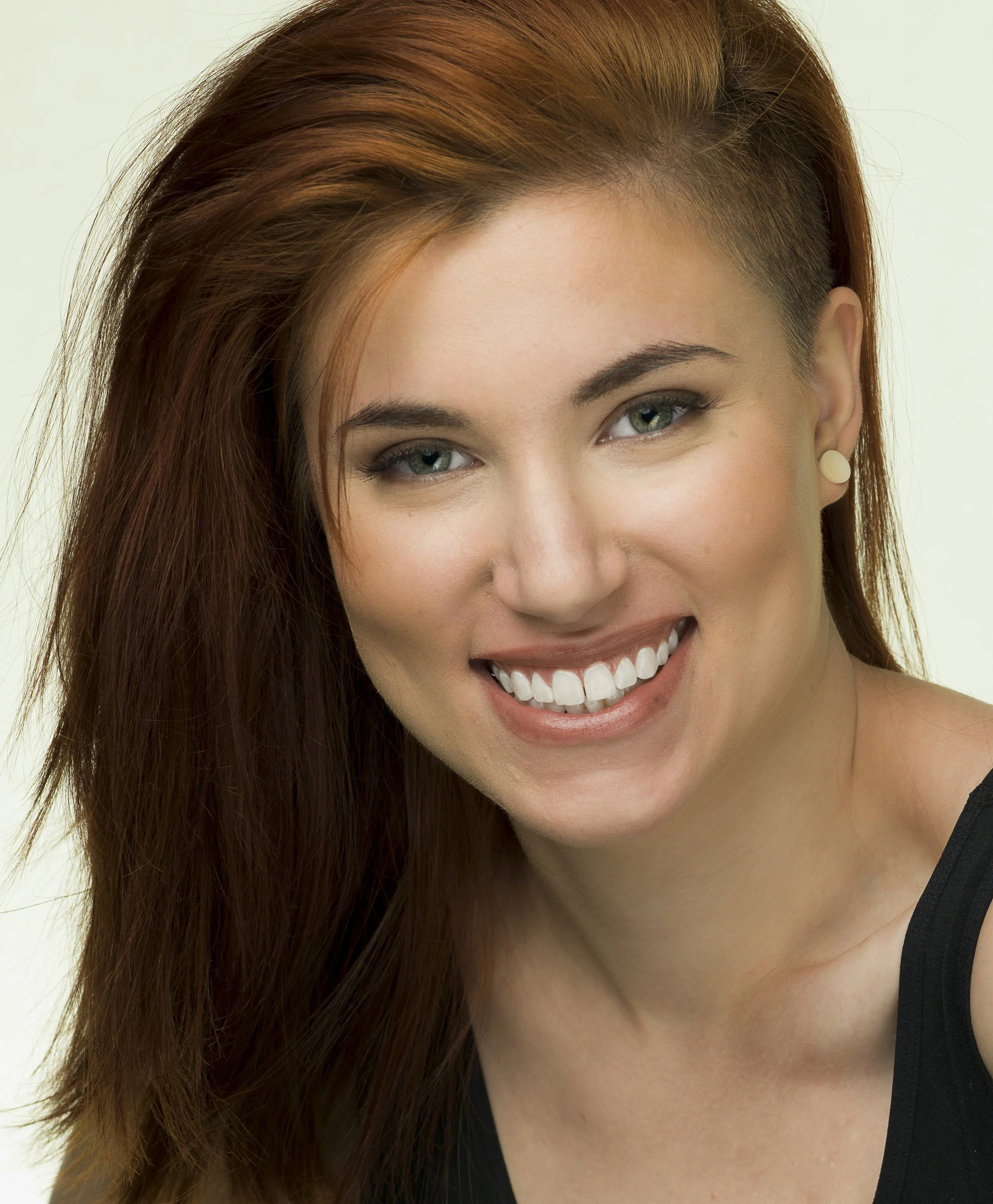 Headshot that captures happy personality by Oliver Solomon