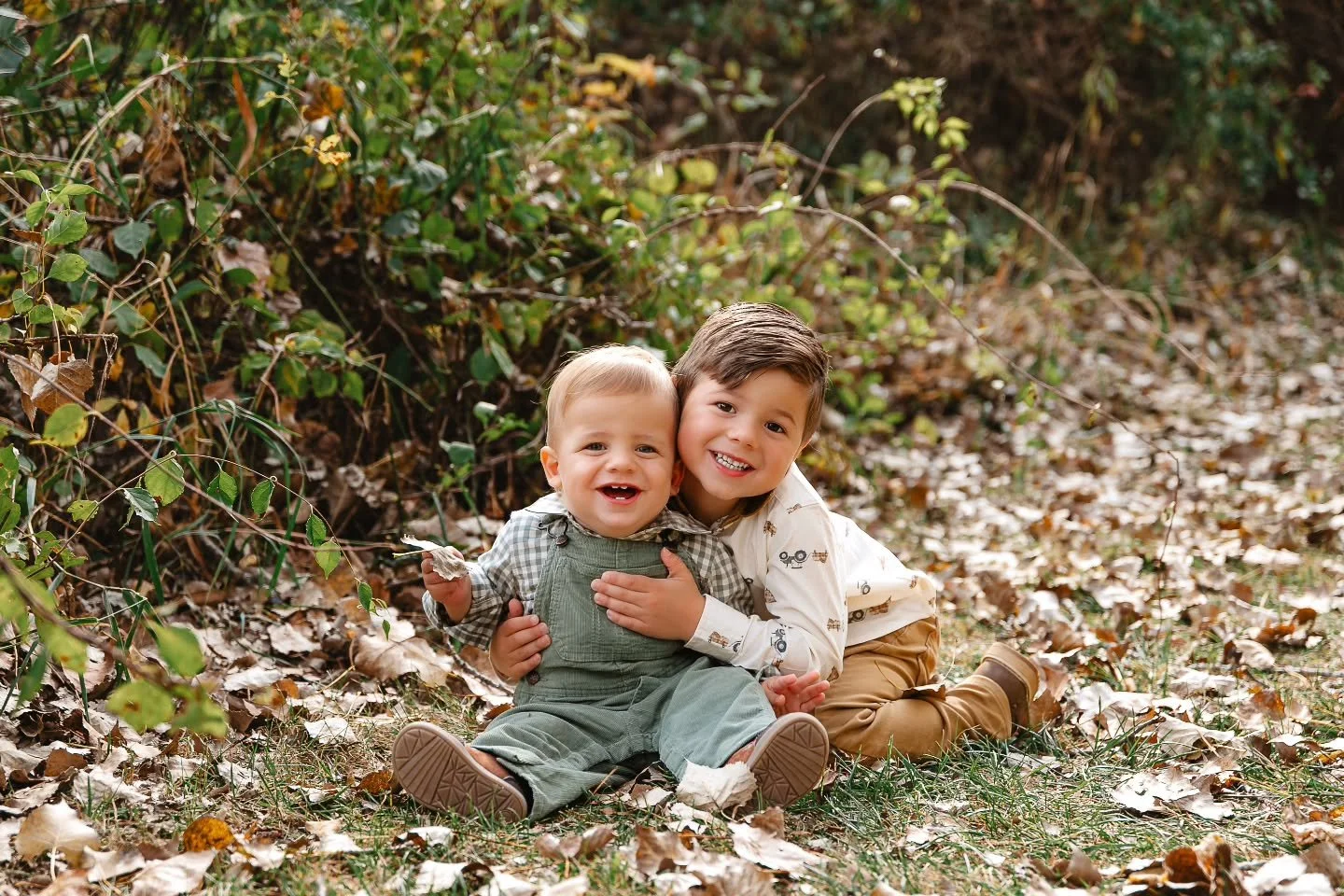 Look at these cuties!!! I can't even begin to explain how much fun I had during this session. There was so much silliness and joy. You wouldn't know that the youngest was constantly falling into the bushes, or the oldest was fully committed to a dino