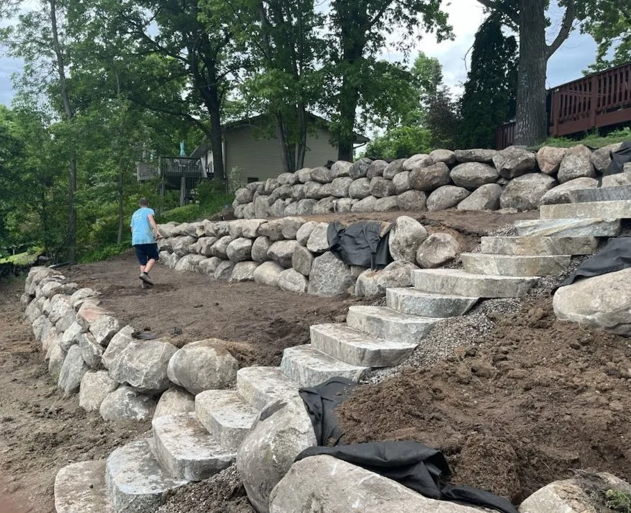 3-tier boulder wall with cut stone steps to lake — Pine City MN — Heritage Outdoors 2024