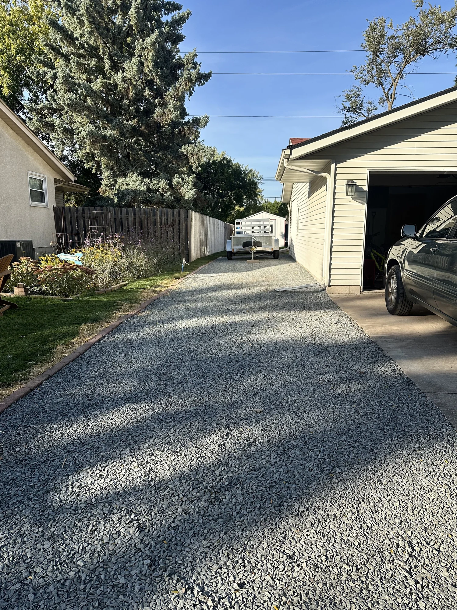 Trap rock driveway surface detail — Roseville, MN — Heritage Outdoors 2025
