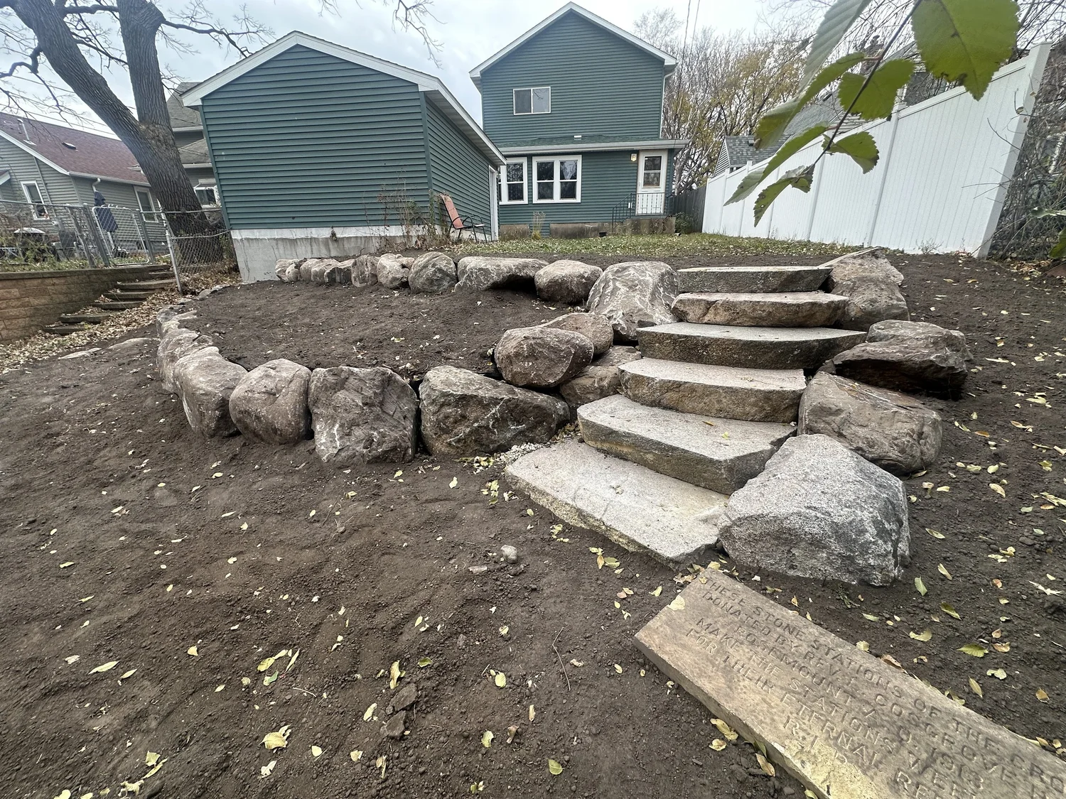 Tiered boulder wall and steps upper view — Saint Anthony Park, Saint Paul — Heritage Outdoors 2025