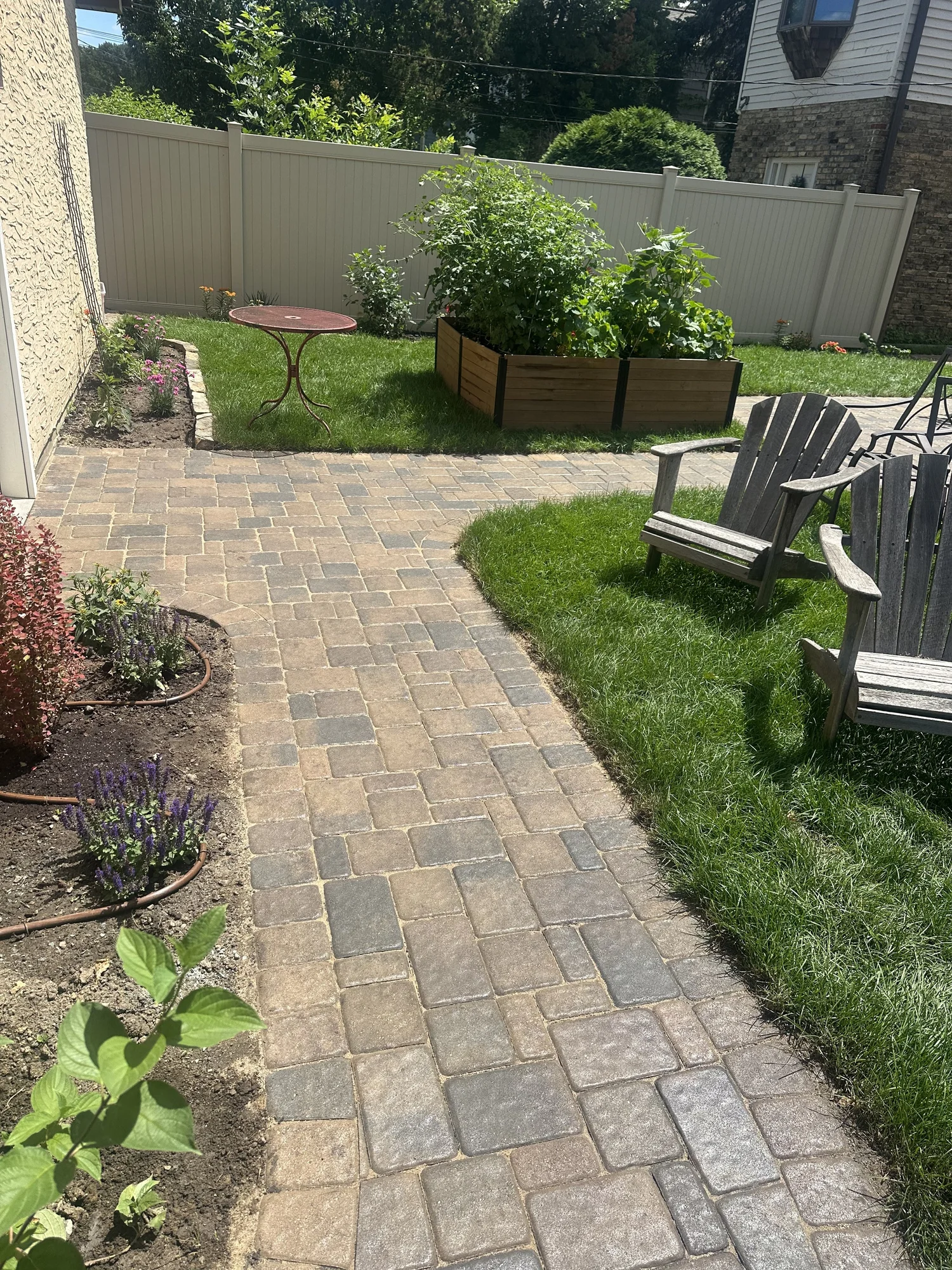 Completed Willow Creek Cobblestone patio walkway and parking pad — Como Park Saint Paul MN — Heritage Outdoors 2025