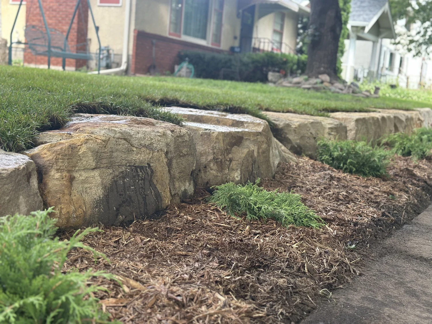 Completed upper yard with sod and planting beds — Saint Paul MN — Heritage Outdoors 2025