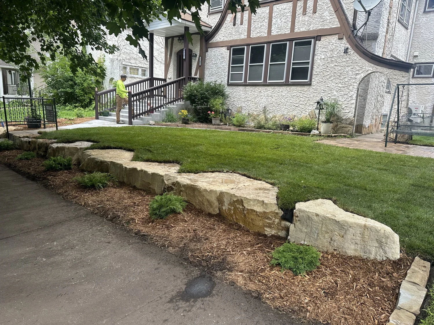 Completed front yard limestone wall street view — Saint Paul MN — Heritage Outdoors 2025