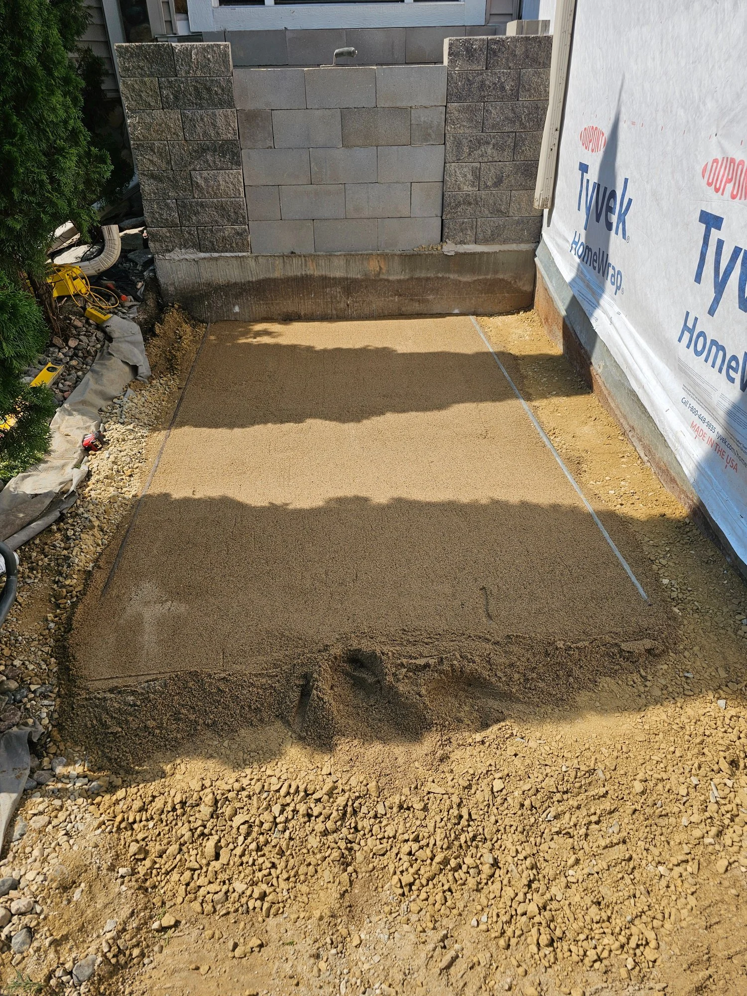 Paver stoop walkway base screeded and leveled ready for pavers — Burnsville MN — Heritage Outdoors