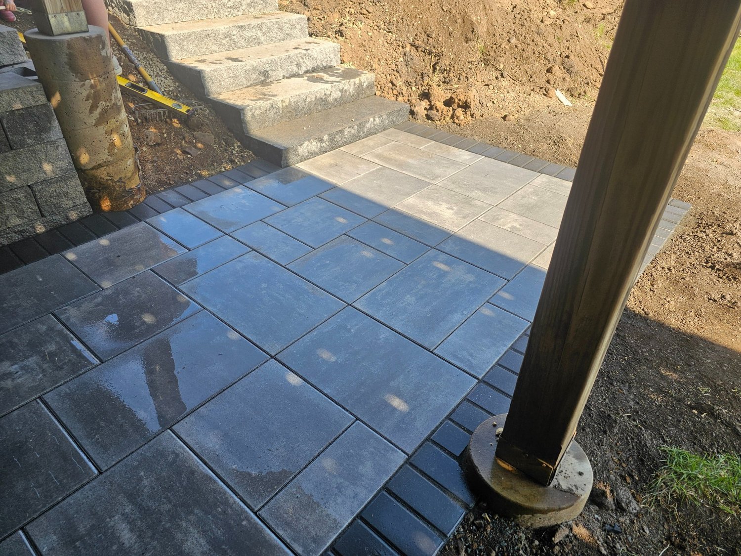 Granite steps and paver walkway connecting back door to pool deck — Lake Elmo MN — Heritage Outdoors