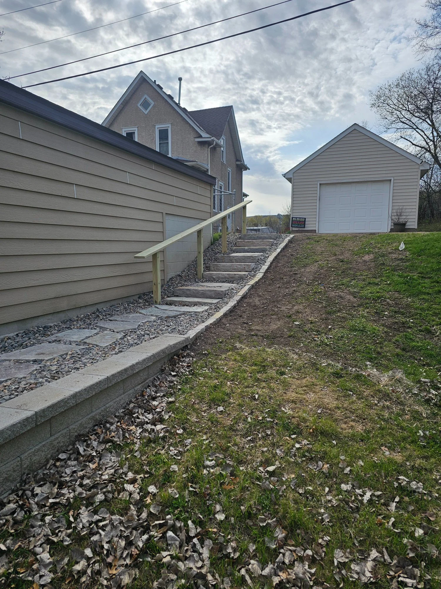 Chilton natural stone steps with handrail alongside Versa-Lok wall — Como Park Saint Paul MN — Heritage Outdoors