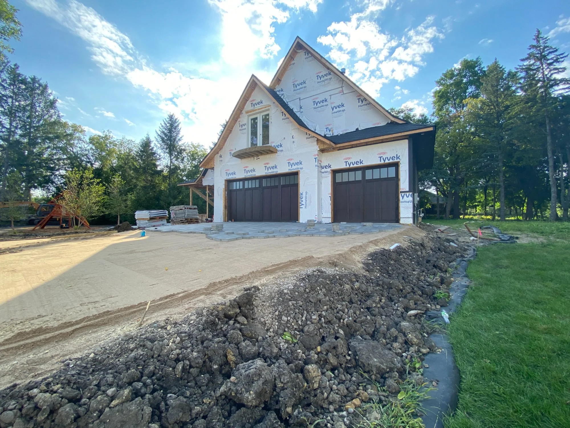 Unilock Treo Smooth pavers starting at garage apron — Plymouth MN — Heritage Outdoors