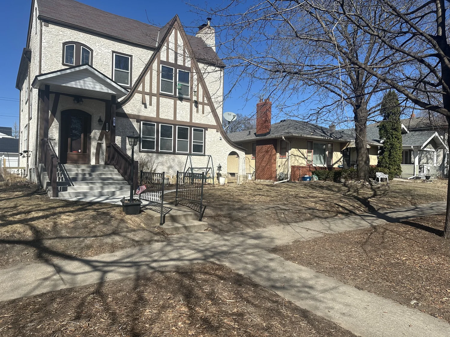 Bare grassy hillside street view before transformation — Randolph Ave, Saint Paul MN — Heritage Outdoors
