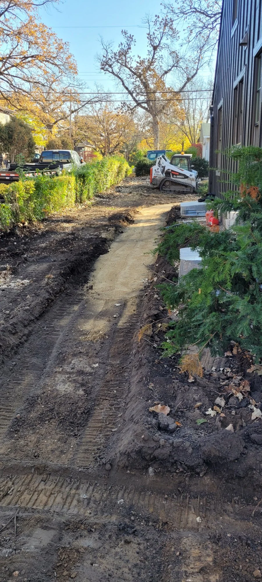 Paver walkway excavation and base preparation with Bobcat — Saint Louis Park MN — Heritage Outdoors 2022