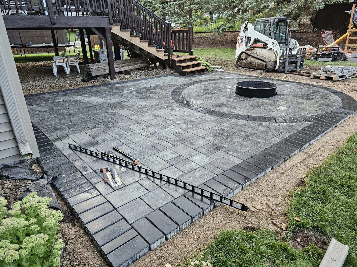 RCP Reno paver patio nearly complete wet — Woodbury MN — Heritage Outdoors 2024