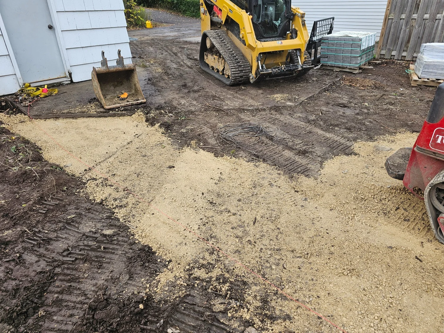 CAT skid steer base prep for walkway — Como Park Saint Paul — Heritage Outdoors 2025