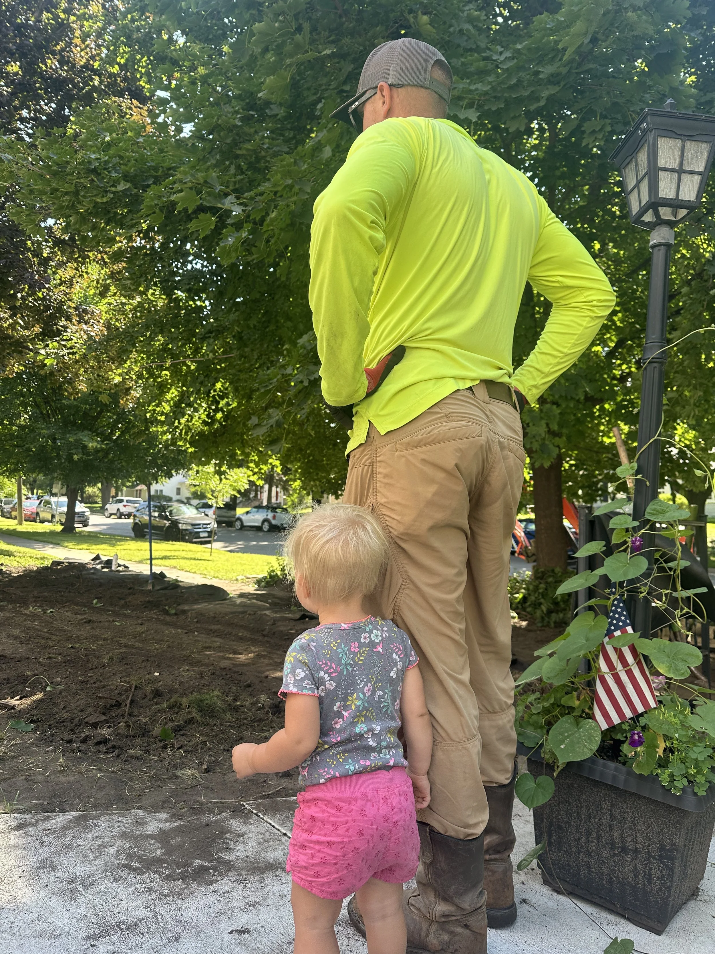 Limestone cube wall installation in progress — Randolph Ave, Saint Paul MN — Heritage Outdoors