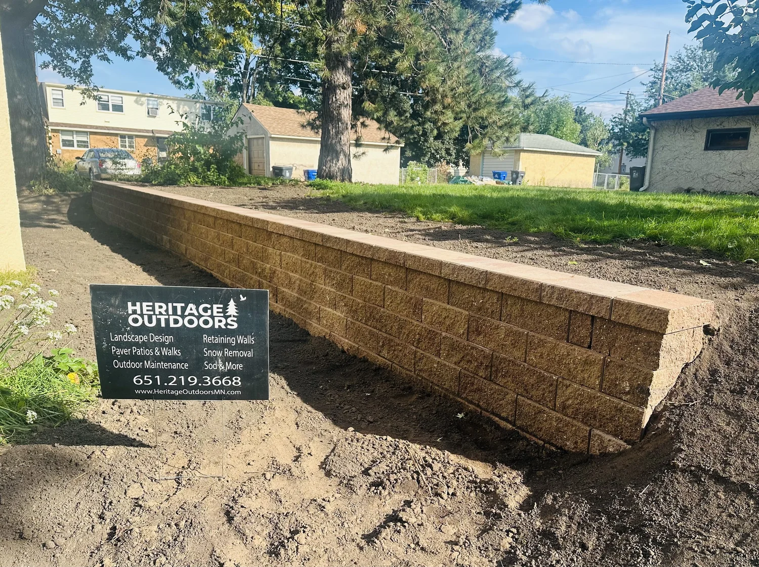 Completed Versa-Lok Standard retaining wall Harvest Blend wide view — Como Park Saint Paul MN — Heritage Outdoors 2025