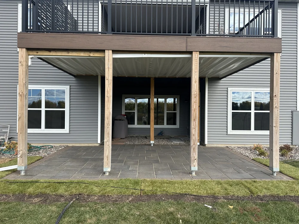 Completed RCP Windom paver patio under deck — Hugo MN — Heritage Outdoors 2025
