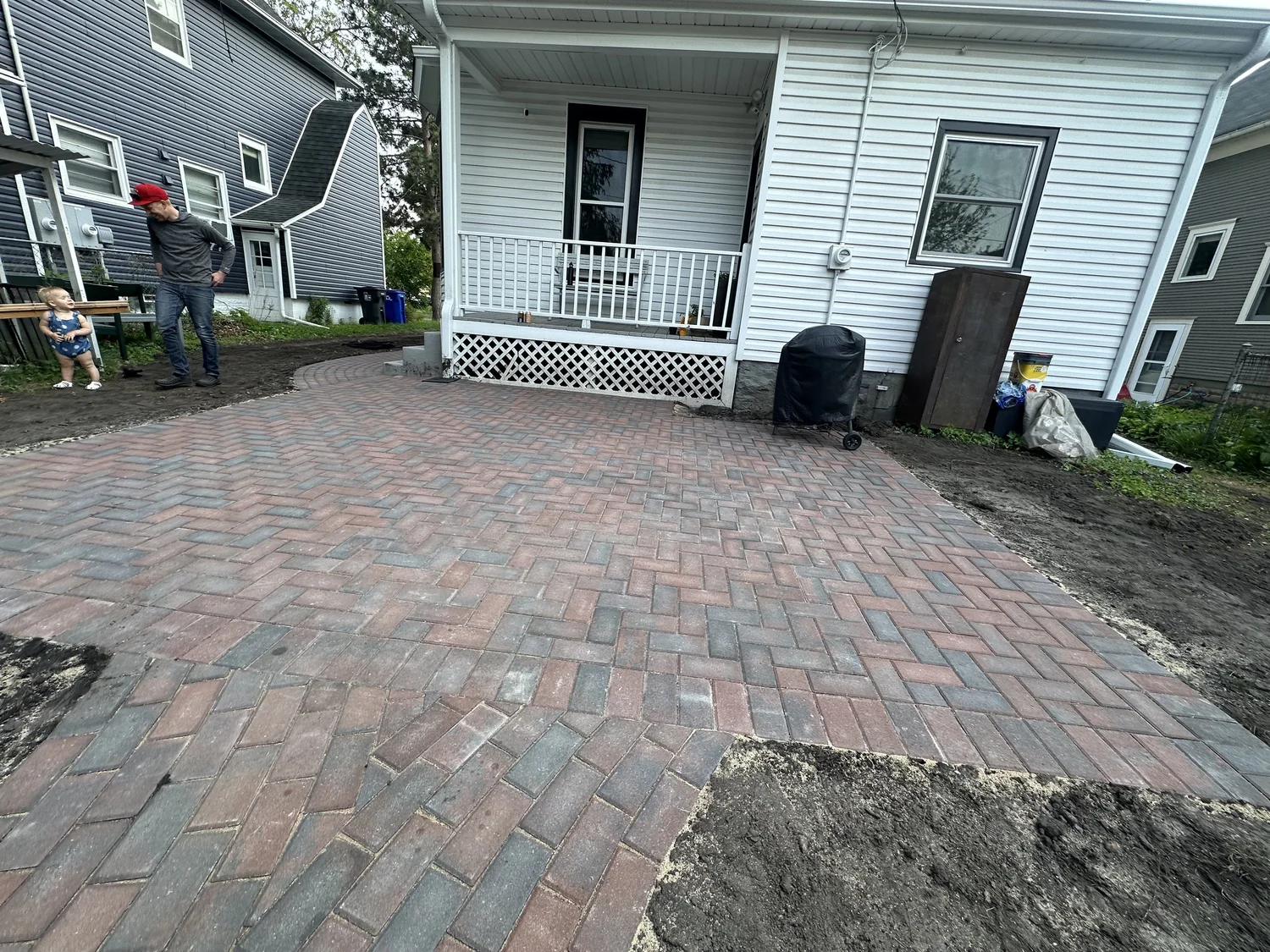 Willow Creek Brickstone herringbone patio installation with Jacob and daughter — Hamline-Midway Saint Paul MN — Heritage Outdoors 2025