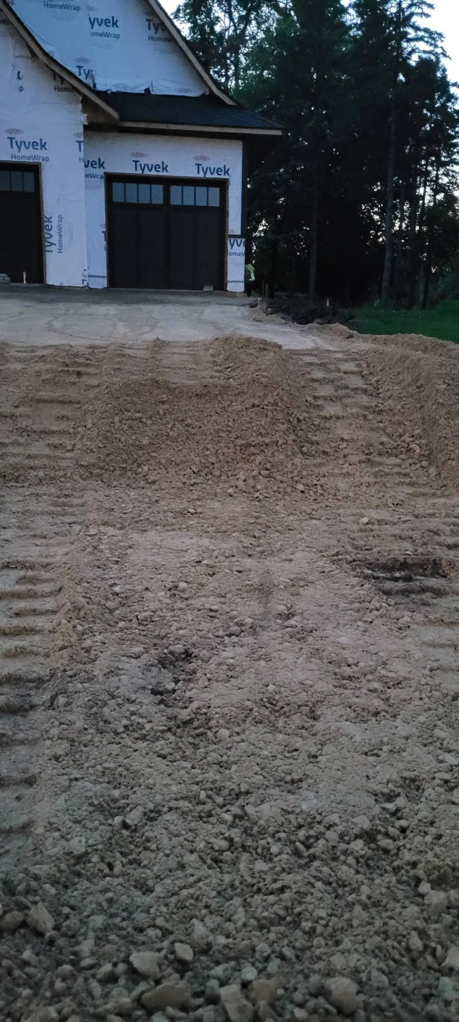 Paver driveway excavation and grading single garage bay — Plymouth MN — Heritage Outdoors
