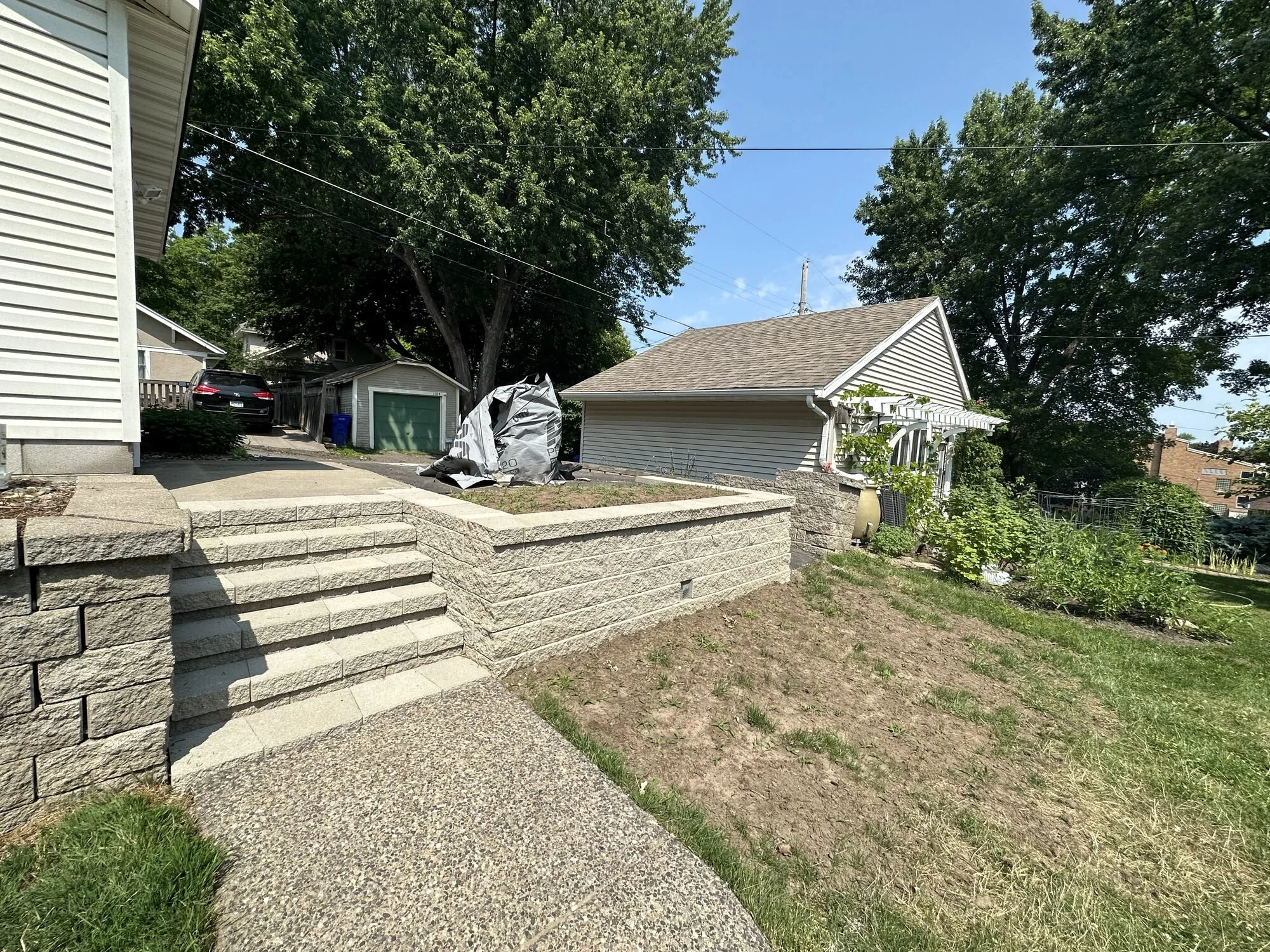 New Versa-Lok block steps and completed retaining wall — Como Park Saint Paul MN — Heritage Outdoors 2023