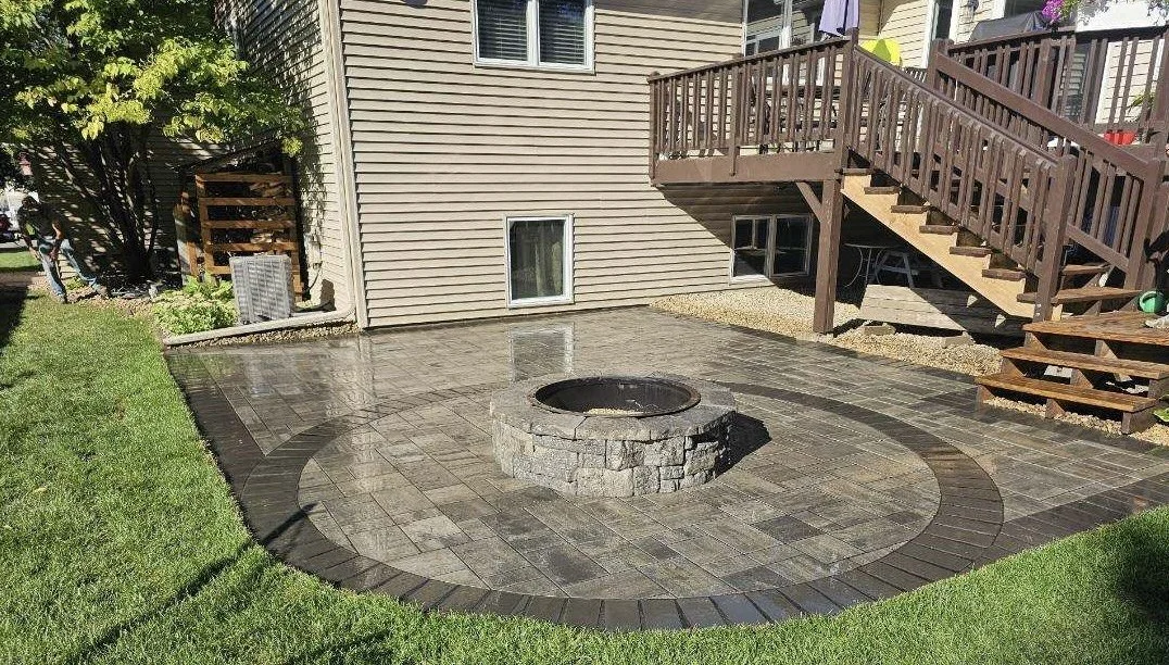 Completed RCP Reno paver patio with Rosetta Belvedere fire pit straight on view — Woodbury MN — Heritage Outdoors 2024