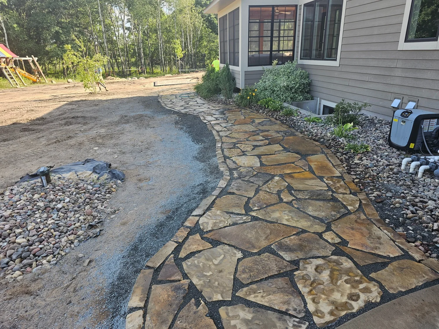 Cafe natural stone walkway on acreage — West Lakeland Township MN — Heritage Outdoors