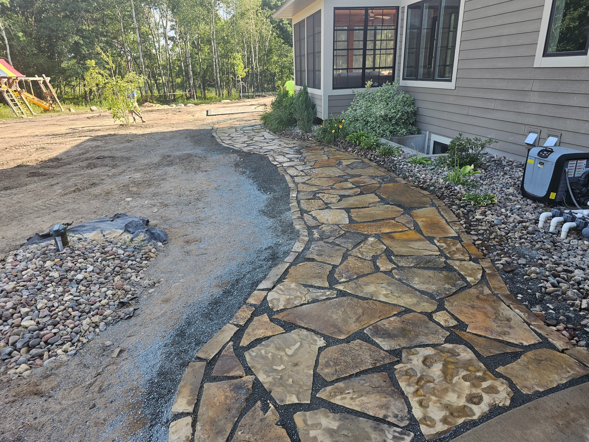 Cafe natural stone walkway on acreage — West Lakeland Township MN — Heritage Outdoors 2023