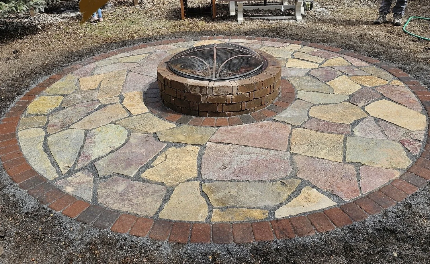Completed flagstone circle patio close up — Highland Park Saint Paul MN — Heritage Outdoors 2025