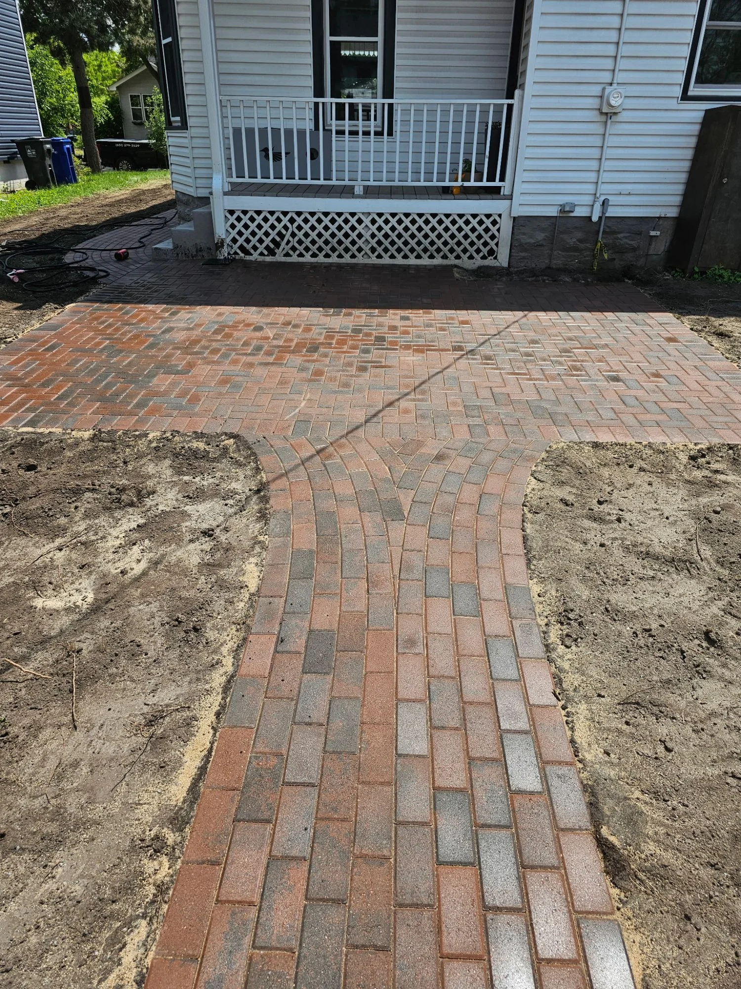 Willow Creek Brickstone RoseCreek Y-split walkway meeting herringbone patio — Hamline-Midway Saint Paul MN — Heritage Outdoors 2025