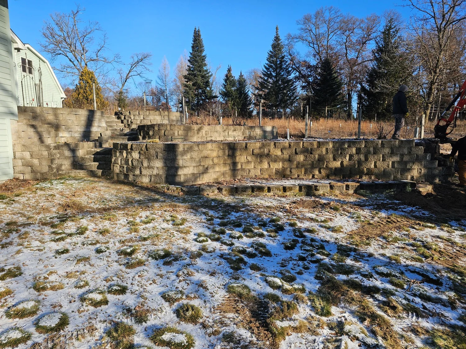 30-year-old deteriorating block retaining wall before replacement — Wyoming MN — Heritage Outdoors