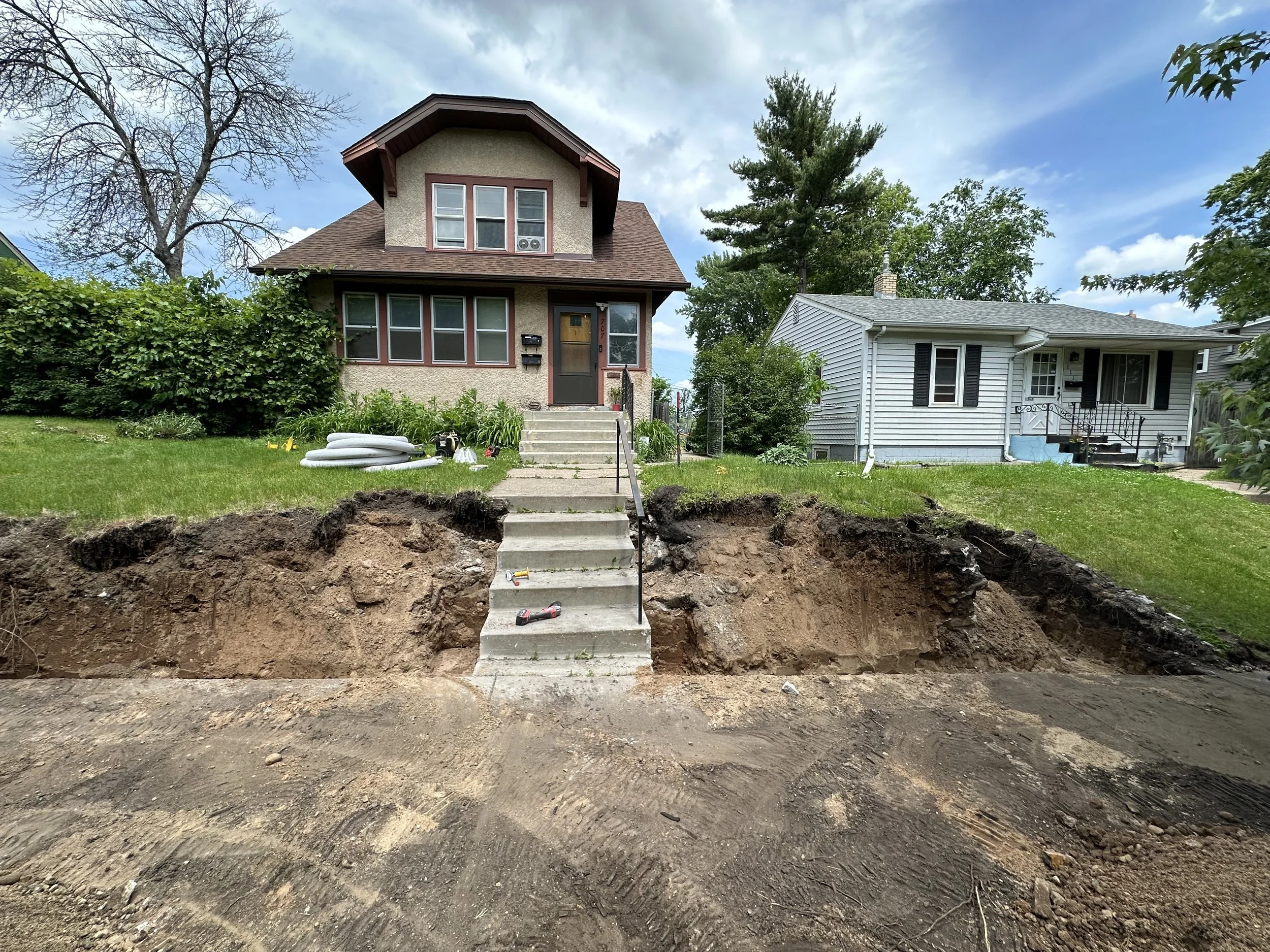 Versa-Lok retaining wall excavation progress — East Saint Paul MN — Heritage Outdoors