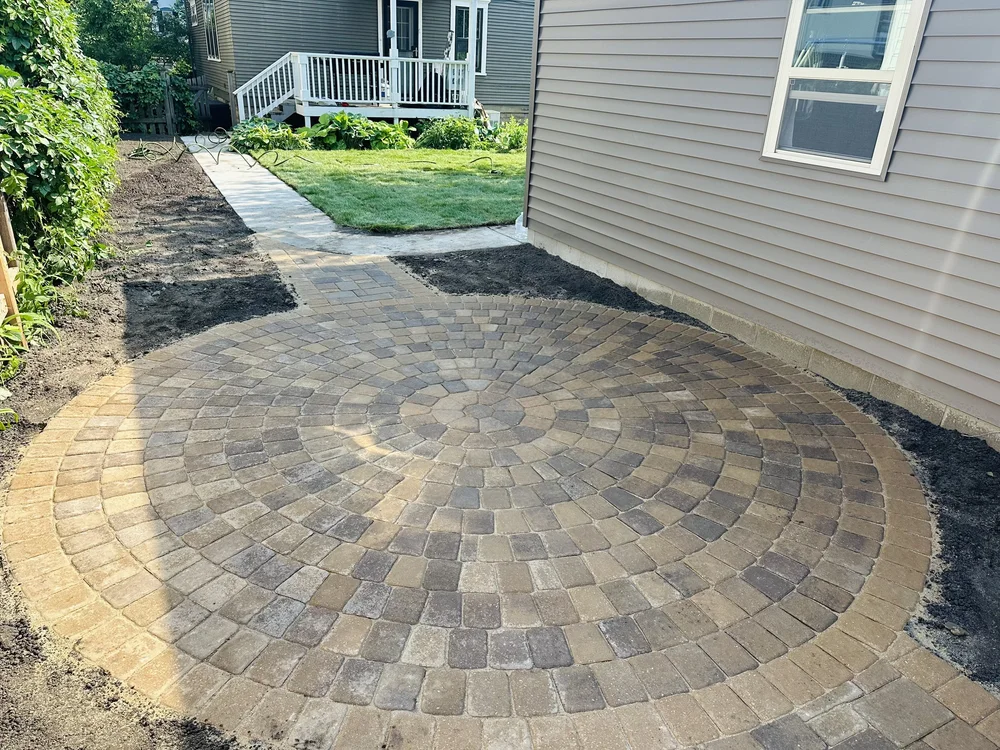 Willow Creek circle kit Chestnut patio with connecting walkway and fresh sod — Mac-Groveland Saint Paul MN — Heritage Outdoors 2025