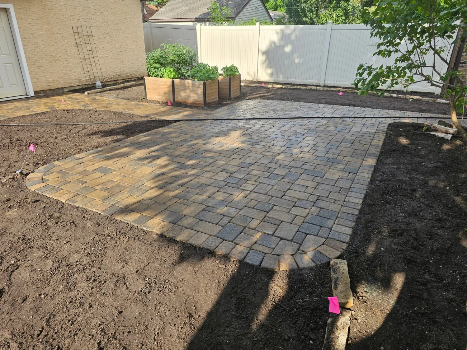 Patio walkway and parking pad progress — Como Park Saint Paul MN — Heritage Outdoors 2025