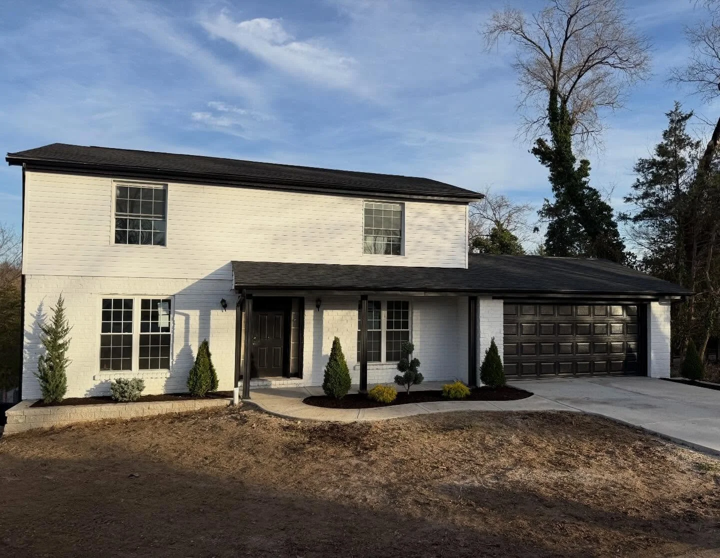 Full exterior transformation 👷&zwj;♂️

Everything is new. Nothing was left untouched.

🛠️ Brick painted
🛠️ New siding
🛠️ New roof
🛠️ New driveway
🛠️ New garage
🛠️ New columns
🛠️ Retaining wall
🛠️ Landscaping

If your home needs more than sur