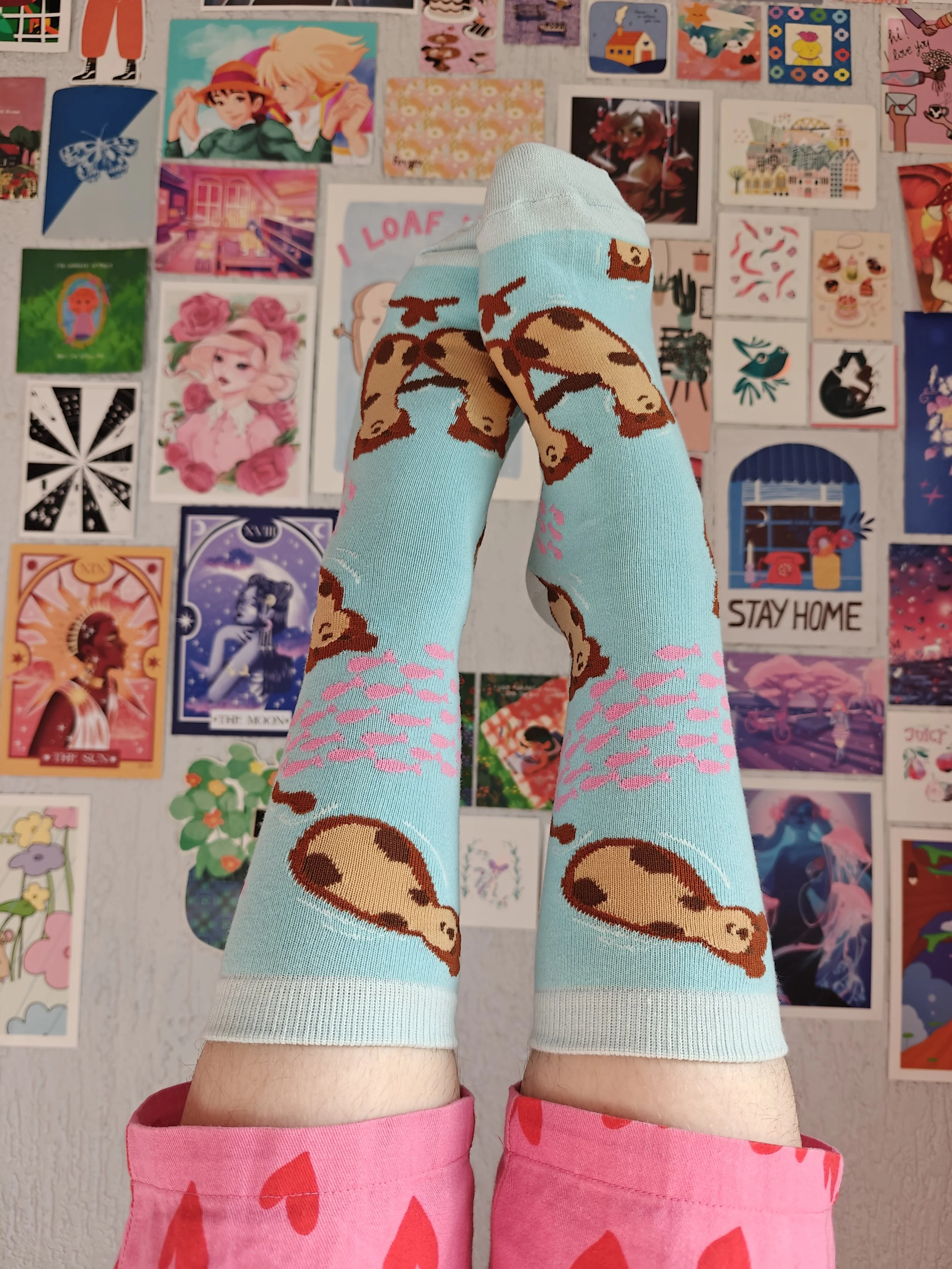 Cute otter fish art socks modeling.jpg