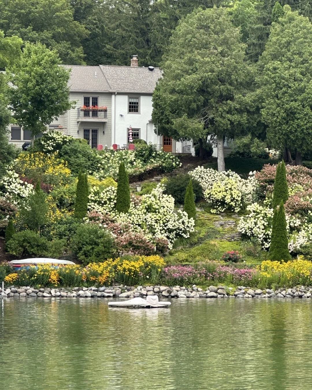 Those are pretty spectacular hydrangeas on this lake house garden! #lakelife #cedarlake #wisconsin #lakecountry #realestate