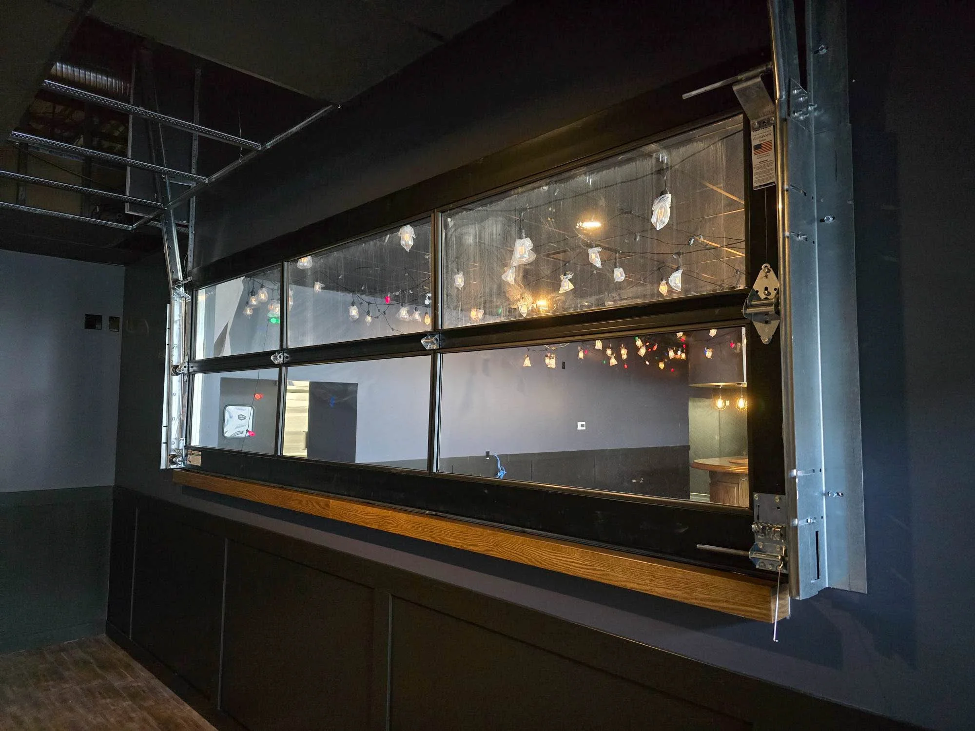 restaurant-bar-millwork-brunel-garagedoor-divider.jpg