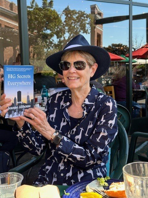 Jeanne Althouse with paperback copy of BIG Secrets Everywhere