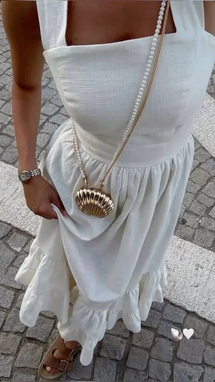 Shell-Inspired White Dress for Milos Seaside Dining