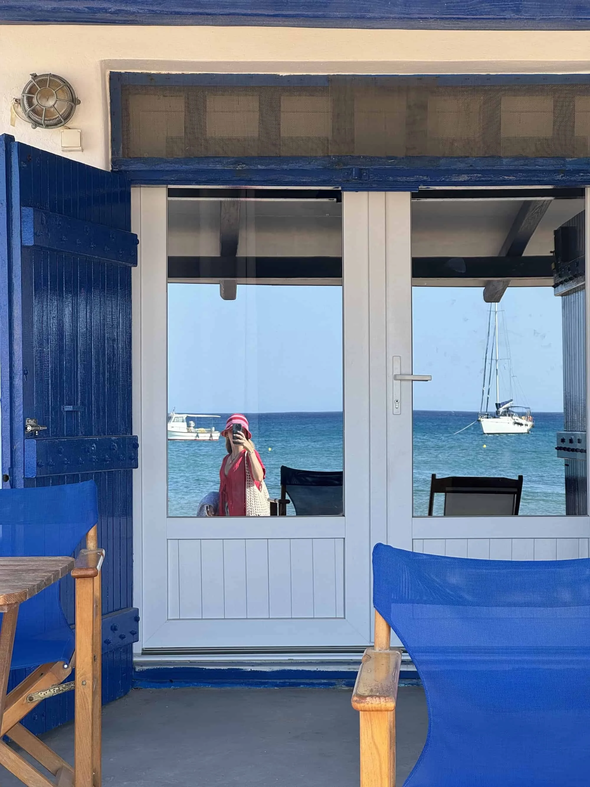 Blue-Trimmed House at Provatas Beach, Milos Greece
