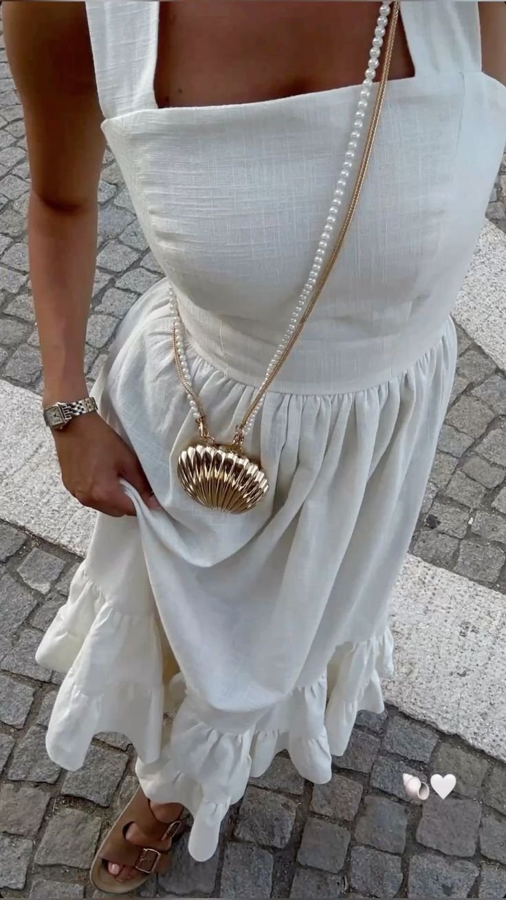 Shell-Inspired White Dress for Milos Seaside Dining