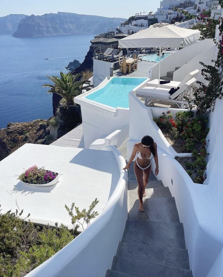 Minimal White Bikini by a Cliffside Infinity Pool in Oia