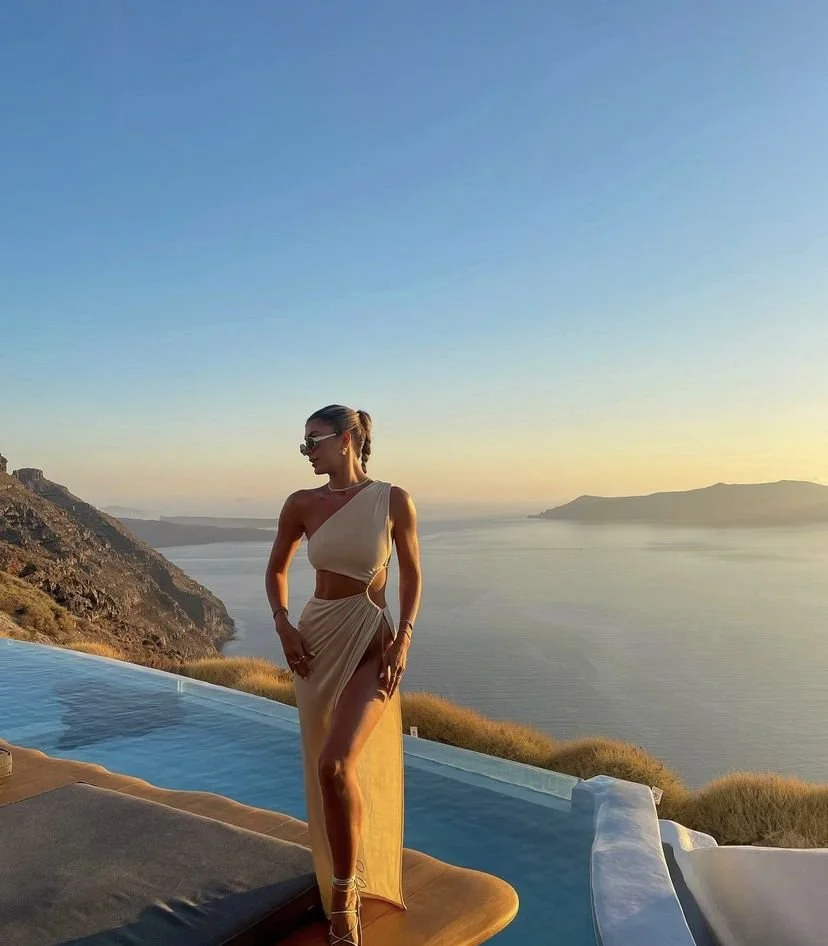 One-Shoulder Champagne Dress at a Cliffside Infinity Pool